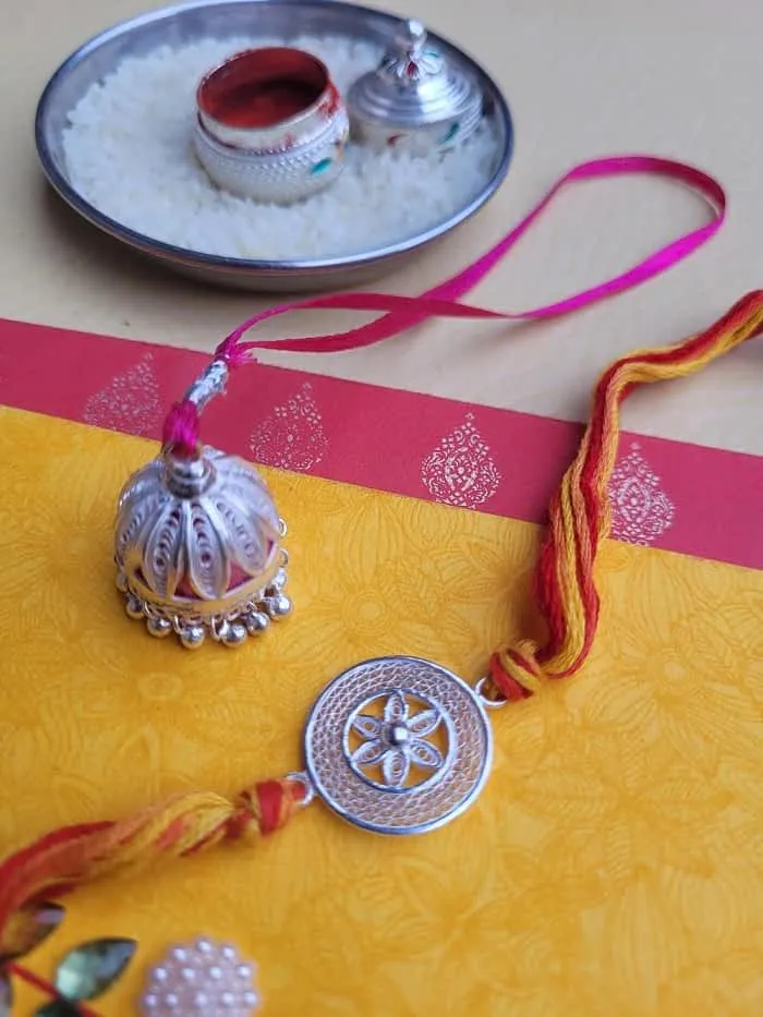 Bond of strength - Silver Rakhi and Lumba Set