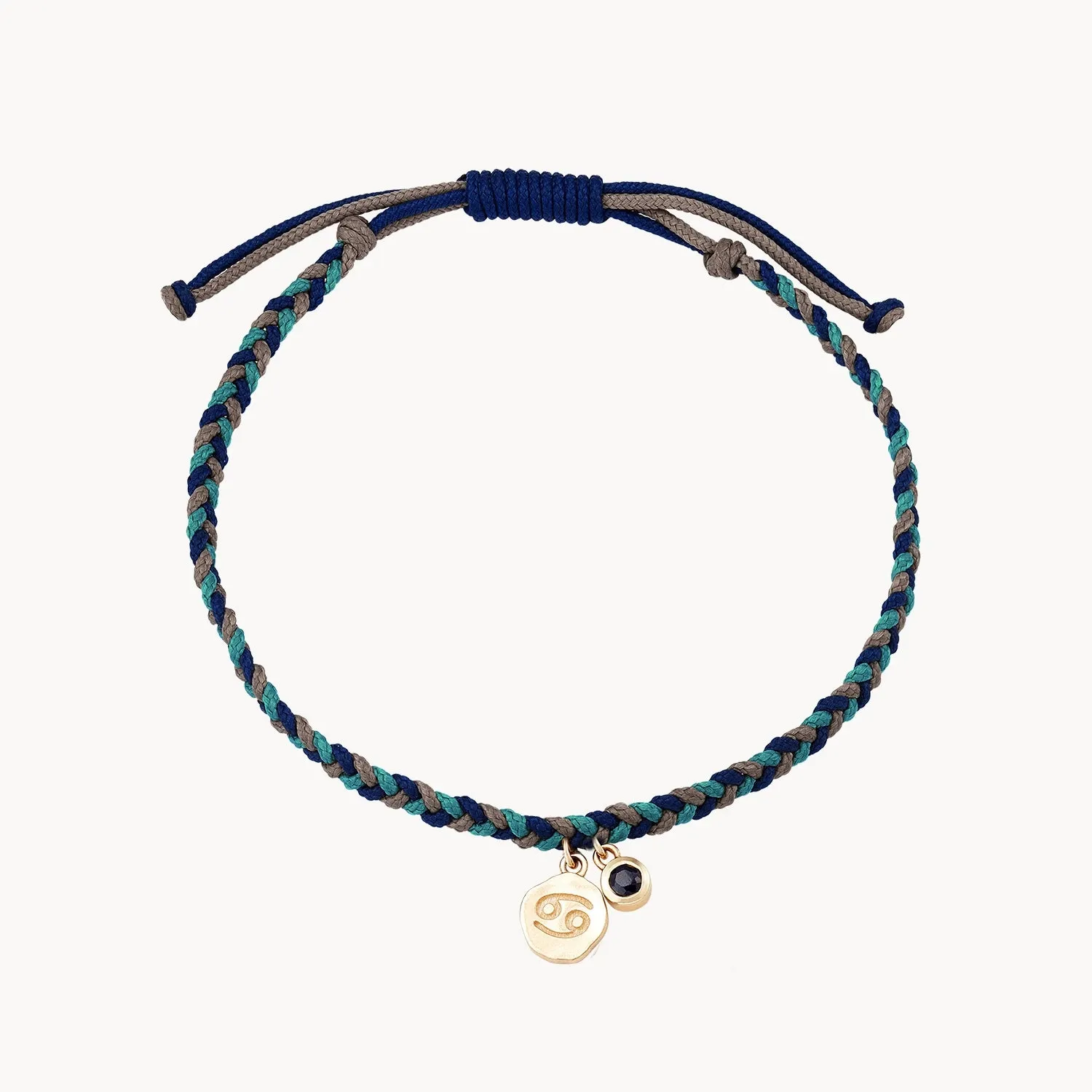 cancer zodiac water element bracelet - 10k yellow gold, blue sapphire, cord