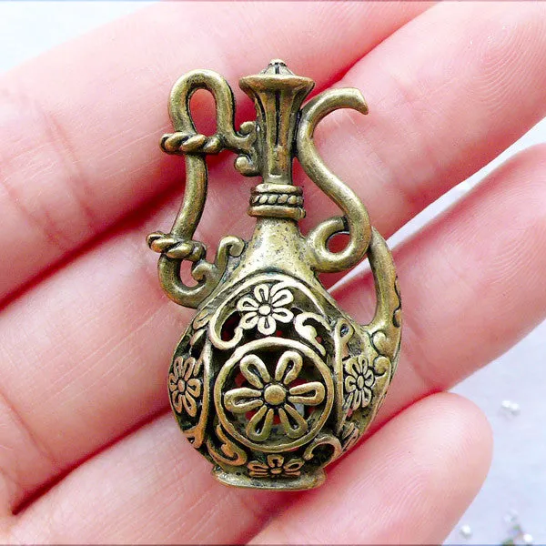 Filigree Teapot Charm in 3D | Hollow Wine Pot Charm | Antique Tea Pot Pendant with Flower Pattern | Dollhouse Flagon Charm | Miniature Tableware Charm in Vintage Style | Zakka Jewelry Supplies (1 piece / Antique Bronze / 22mm x 36mm / 2 Sided)