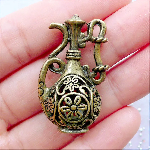 Filigree Teapot Charm in 3D | Hollow Wine Pot Charm | Antique Tea Pot Pendant with Flower Pattern | Dollhouse Flagon Charm | Miniature Tableware Charm in Vintage Style | Zakka Jewelry Supplies (1 piece / Antique Bronze / 22mm x 36mm / 2 Sided)