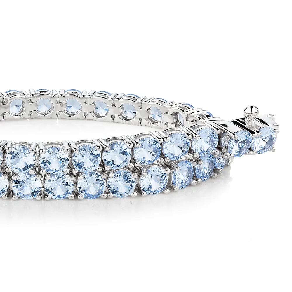 Round Brilliant tennis bracelet with aquamarine simulants in sterling silver