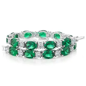 Round Brilliant tennis bracelet with emerald simulants and 3.36 carats* of diamond simulants in sterling silver