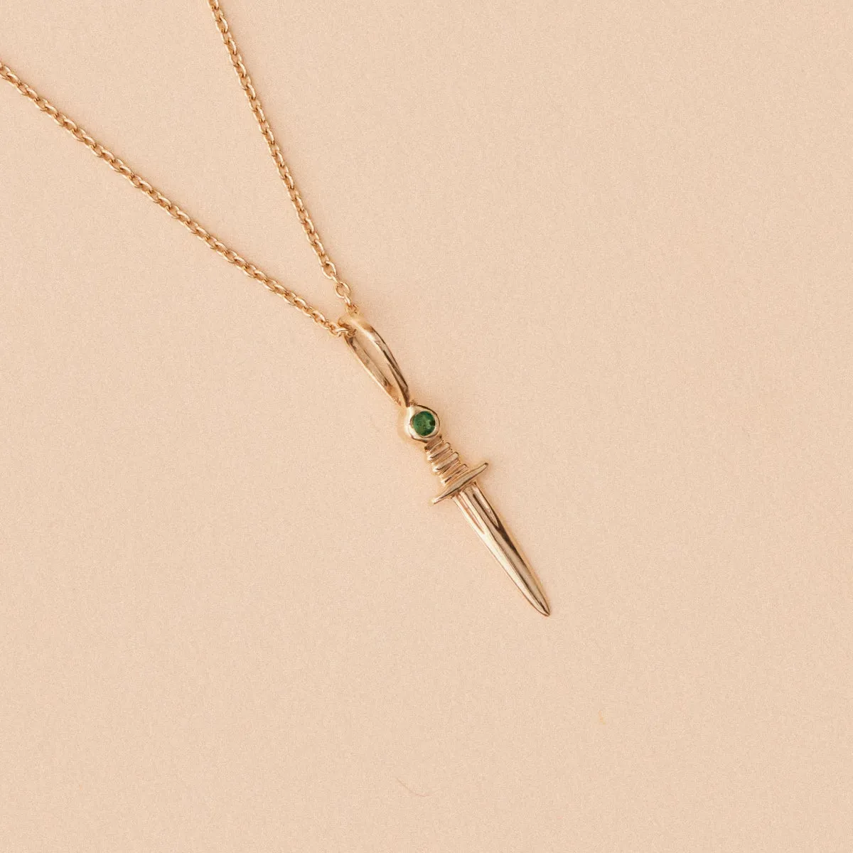 small dagger charm with emerald - 10k yellow gold, natural gemstones