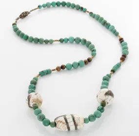 Tibetan bone inlaid with Turquoise & Turquoise & Tiger Eye beads on a Brass clasp